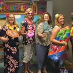 Advocate Capital Employees Celebrate Summer Solstice – Let’s Luau!