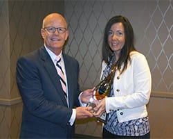 Amy Johnson Presented with Paralegal of the Year Award Trophy